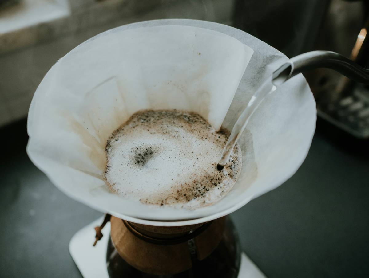 Stainless steel reusable coffee filter demonstrating what is sustainable coffee